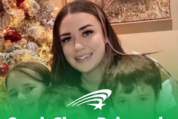 An image of Sarah Shaw with a green fade on the bottom of the screen. White text says "Sarah Shaw released from ICE custody after 3 weeks."