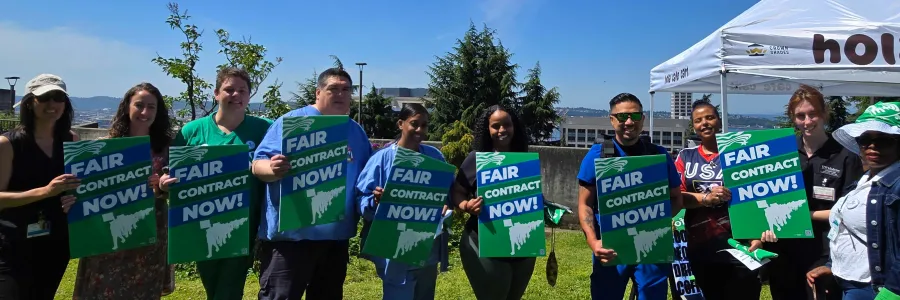 WFSE Members at View Park holding FAIR CONTRACT NOW signs