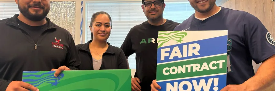 DOC members holding fair contract now signs