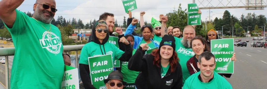 members rallying for union contracts
