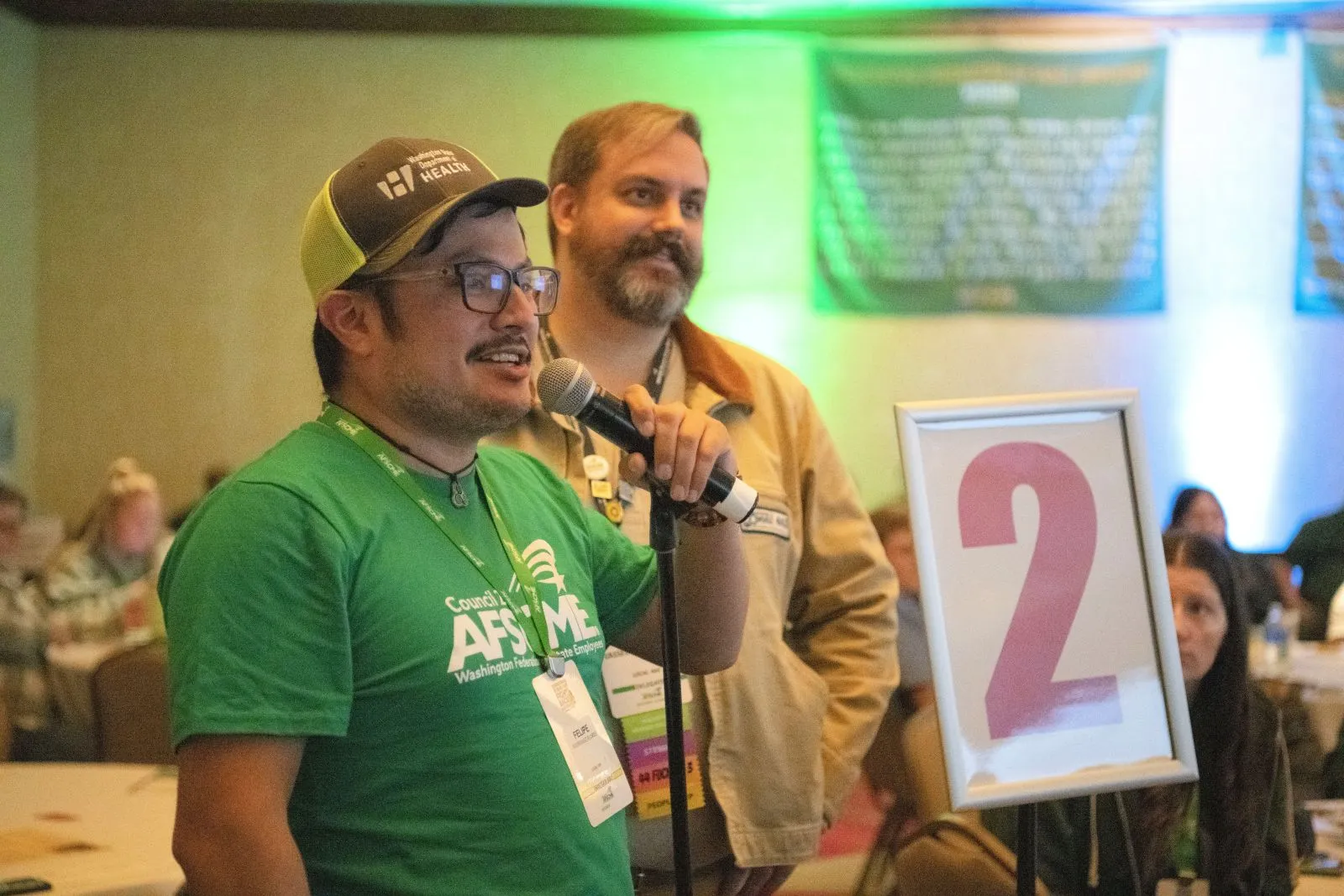 delegates at the mic